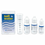The Sodium Chloride Test Kit - 3156 features a labeled plastic box, a clear measuring cylinder marked in milliliters, and three white reagent bottles with blue and white labels, all arranged on a white background.