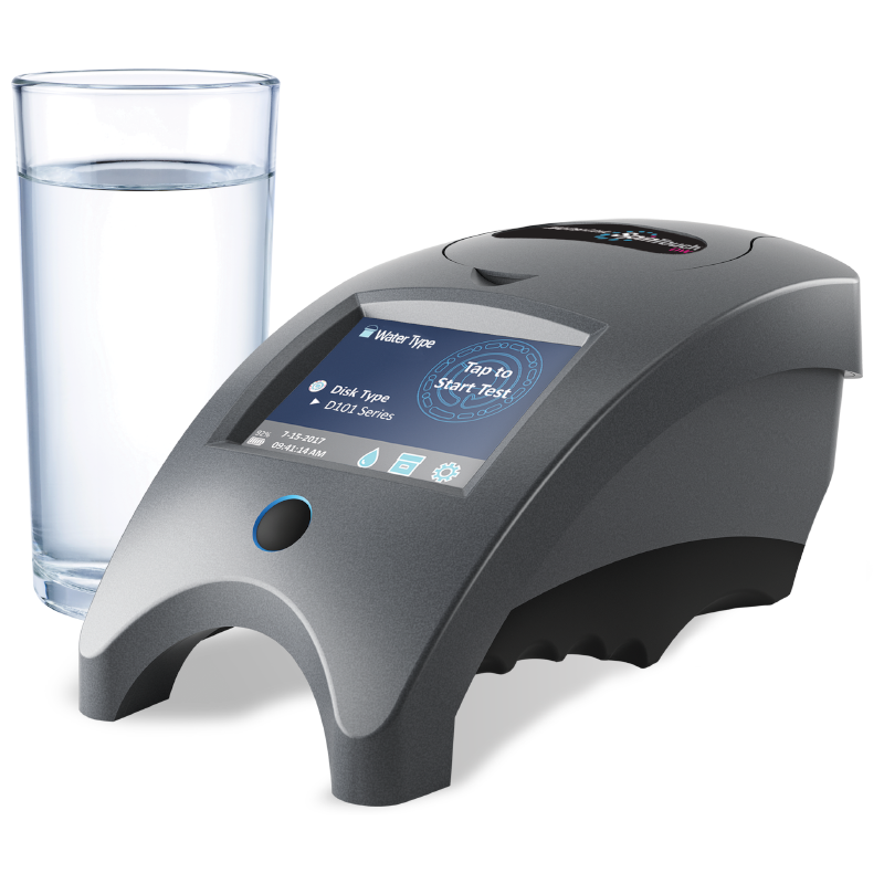 A modern WaterLink Spin Touch DW Sales Demonstration Outfit - 4-3085 digital water testing device with a touchscreen display sits next to a clear glass filled with water on a white surface.