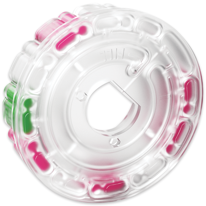 Un flotador inflable transparente con forma de rueda, con segmentos rosas y verdes alrededor de sus laterales y un recorte central, que recuerda al diseño del Cartucho de Reactivo SpinDisk - 4337-H. Perfecto para sentarse o tumbarse con estilo.