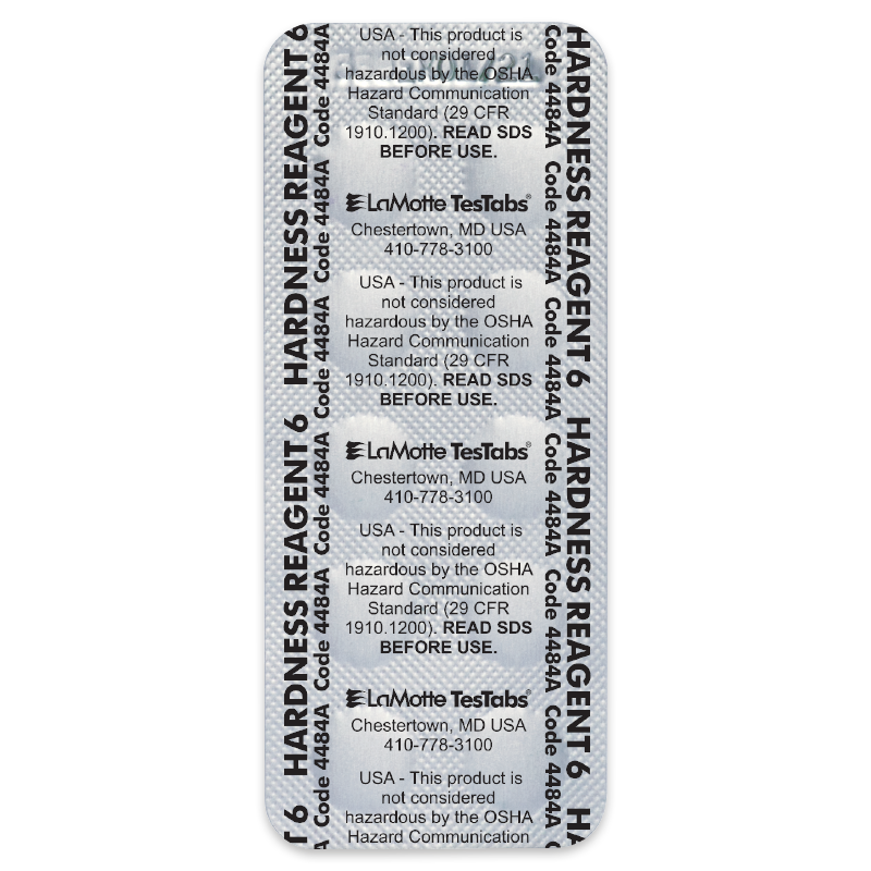 A blister pack labeled HARDNESS REAGENT, Code 4484, LaMotte TesTabs, with warnings stating the product is not considered hazardous by OSHA standards. Pills are visible underneath the packaging.