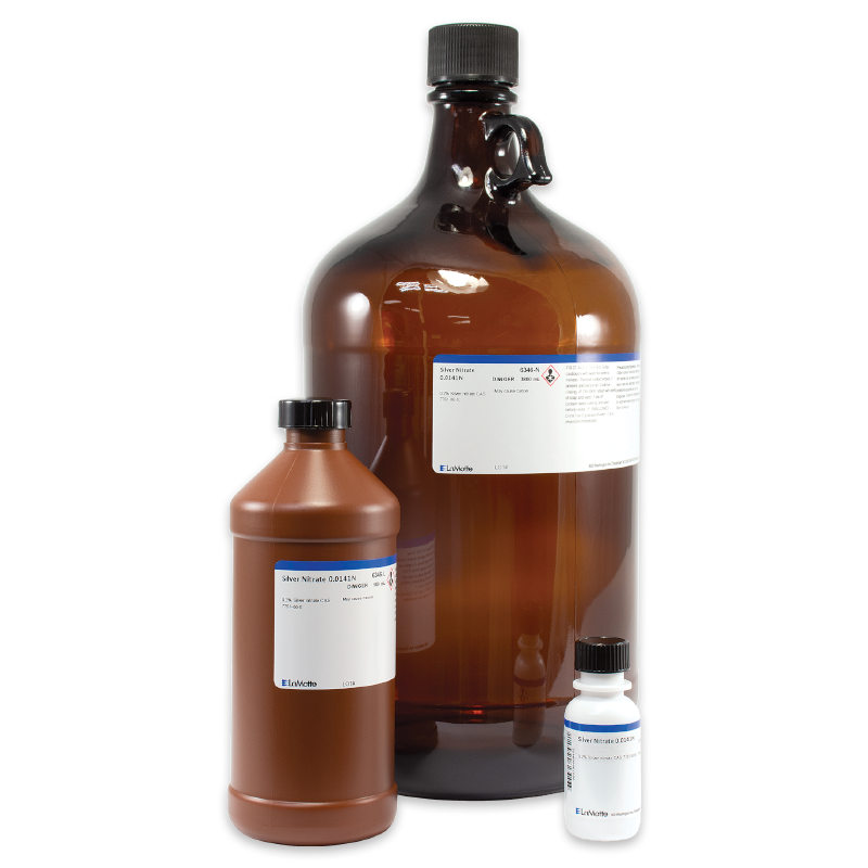 Three brown laboratory bottles of different sizes with white and blue labels are arranged together on a plain white background. The largest bottle has a handle and a black cap.