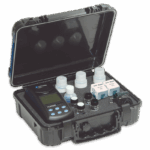 A black hard case opened to reveal a portable water testing kit, including the TC3000T Turbidity, Chlorine & Color Meter - 1975-T, reagent bottles, small sample containers, and test accessories arranged neatly inside.